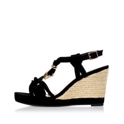 Black knotted wedge sandals